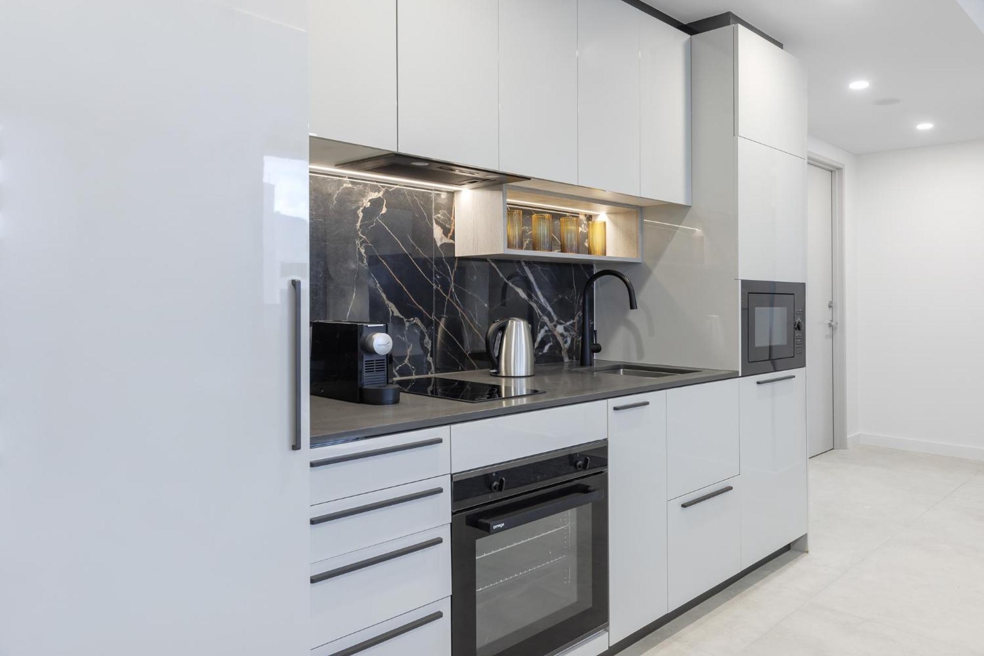 Meriton Suites Canberra Bagian luar foto A modern kitchen