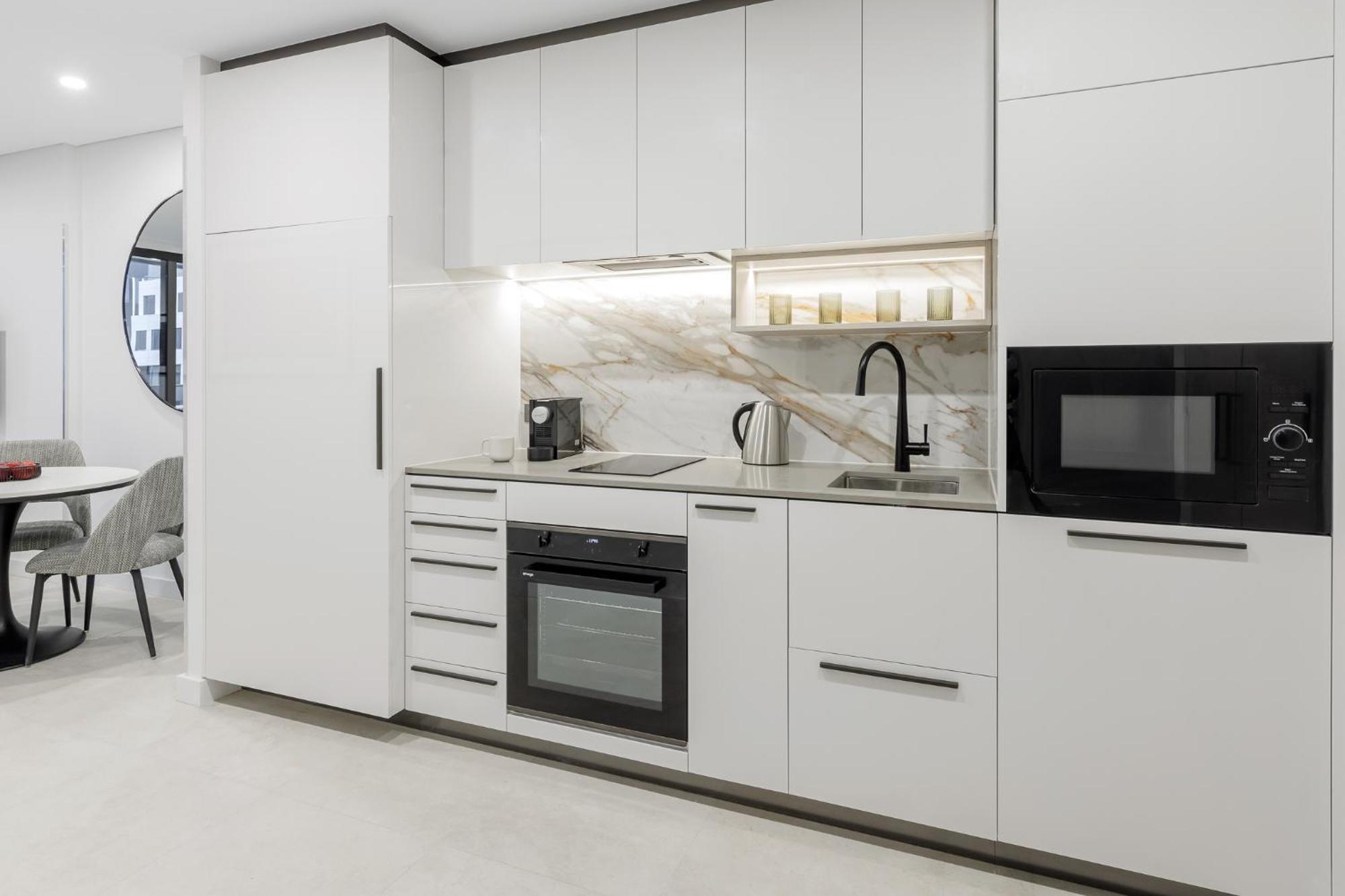 Meriton Suites Canberra Bagian luar foto A modern kitchen