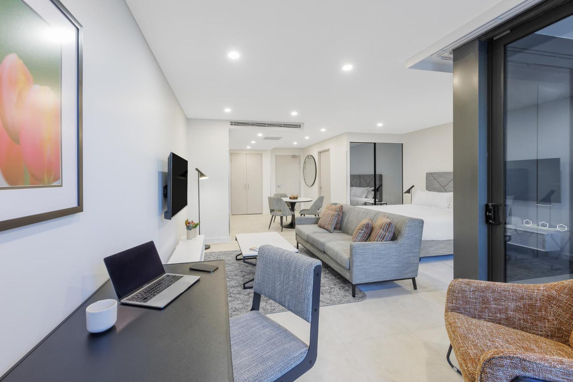 Meriton Suites Canberra Bagian luar foto A typical apartment interior